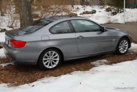 2011 335xi coupe side rear.jpg